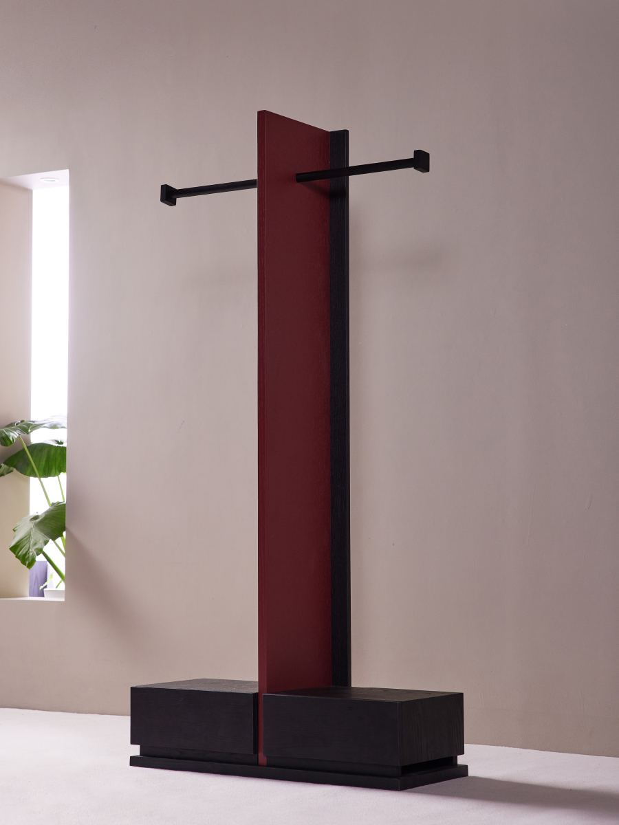 Totem Valet Stand with an oxblood colour panel and black wood post