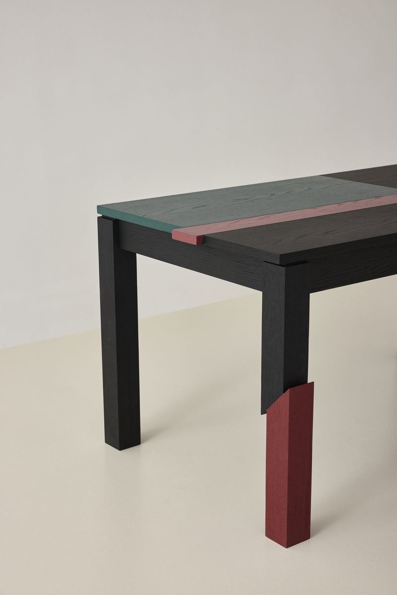 Block Table leg detail in black and burgundy