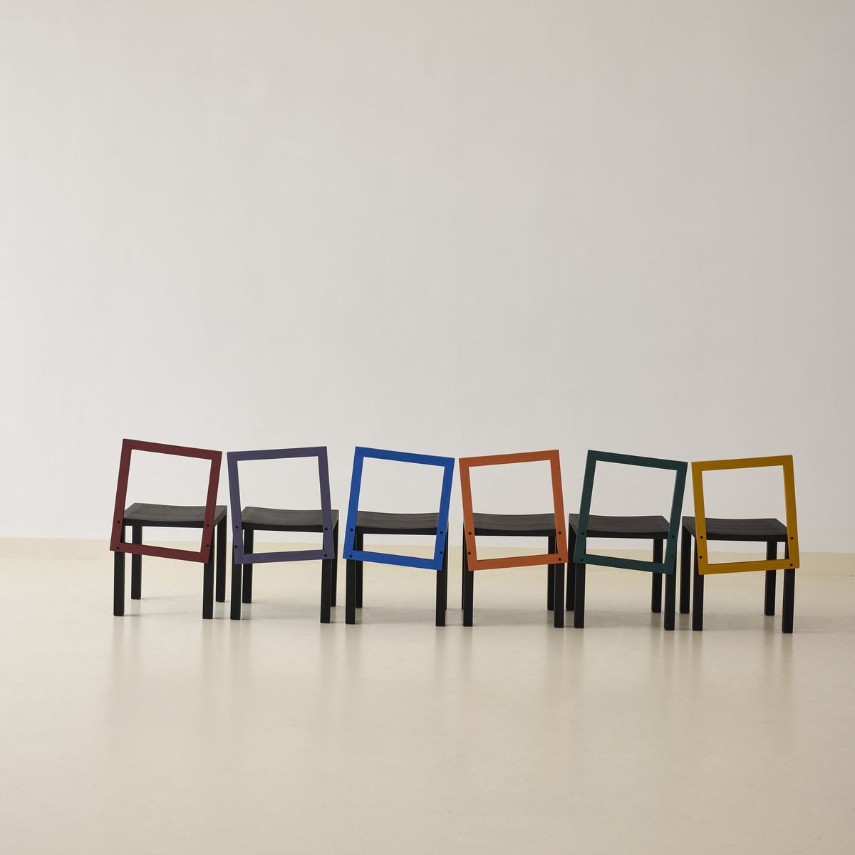 A row of Block Chairs in different colour combinations